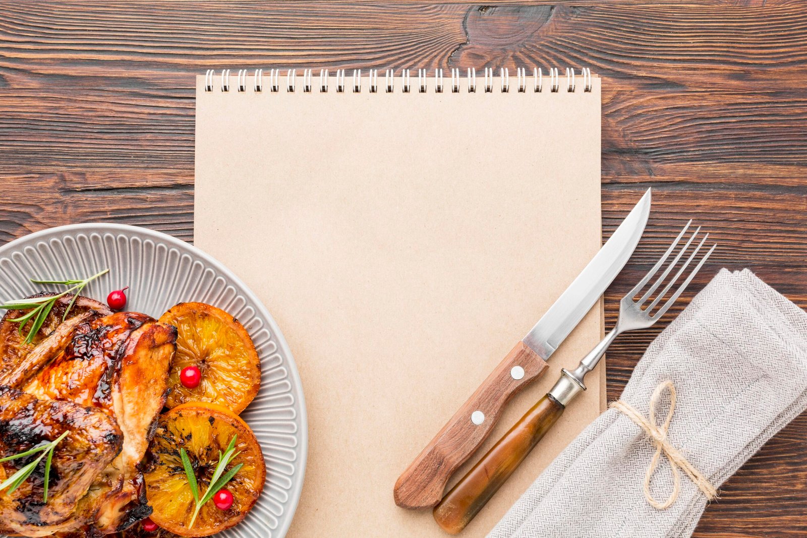 Top View Baked Chicken Orange Slices Plate With Cutlery Blank Notebook Top View Baked Chicken Orange Slices Plate With Cutlery Blank Notebook